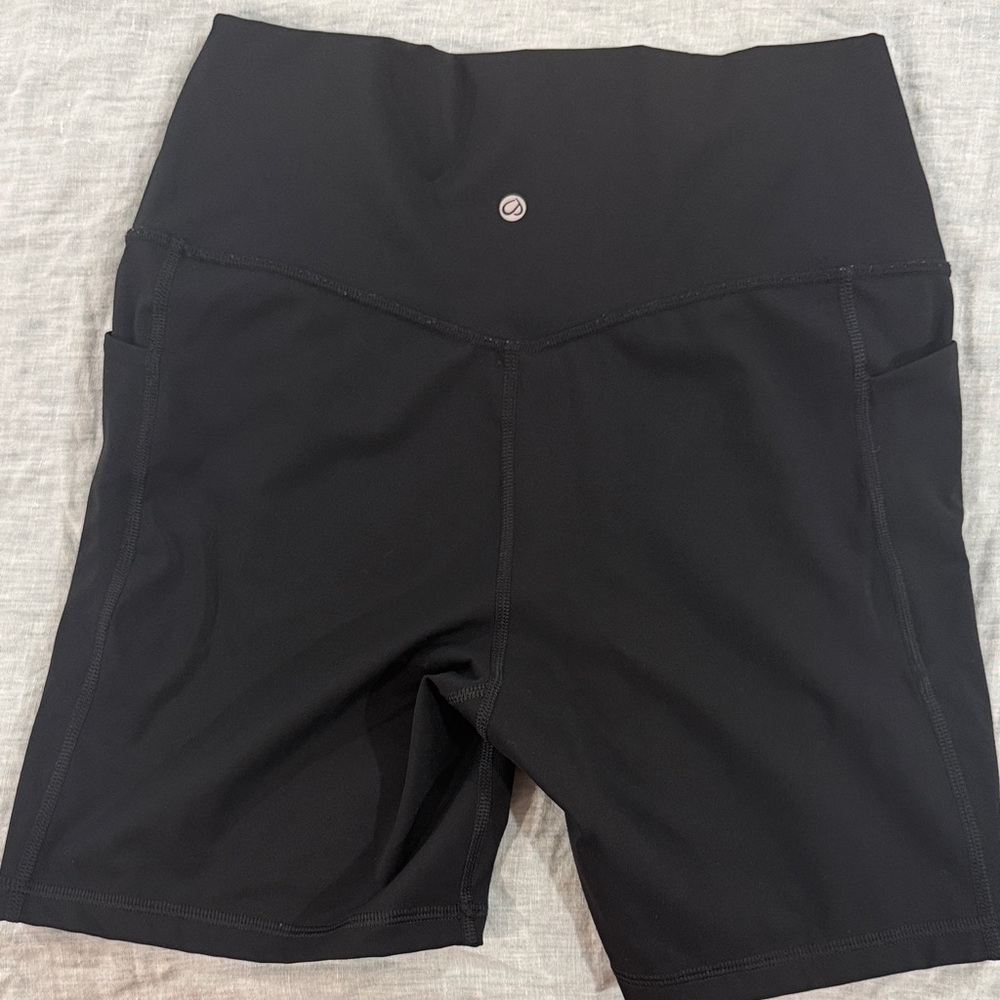 CRZ YOGA Black High-Rise Bike Shorts with Side Pockets